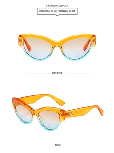 Detail of cat-eye sunglasses with orange-blue gradient frames and brown gradient lenses