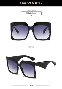 Front and 45-degree side view of bold black square frame sunglasses with gradient lenses