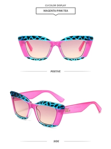 Détail de lunettes de soleil œil-de-chat magenta avec imprimé léopard bleu et logo doré