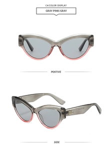 Detail view of cat eye sunglasses with gray pink gradient frames and golden LH logo
