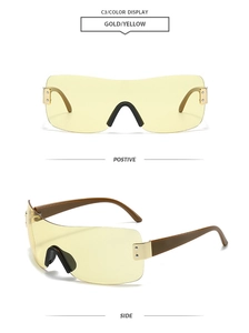 Detaillierte Vorder- und Seitenansicht der rahmenlosen Shield-Sonnenbrille mit gelben Gläsern
