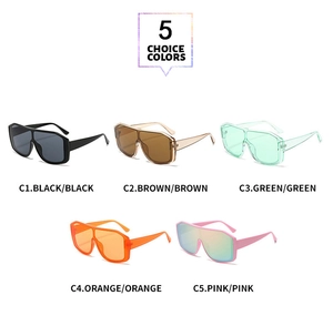 Collection of oversized shield sunglasses in black, brown, green, orange, and pink colors