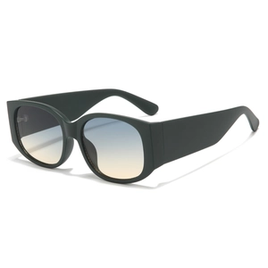 Vintage oversized sunglasses with bold dark frames and vibrant blue to orange gradient lenses