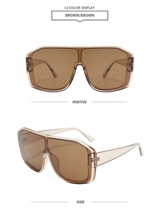 Brown oversized wrap-around cycling sunglasses with transparent frames and UV protection