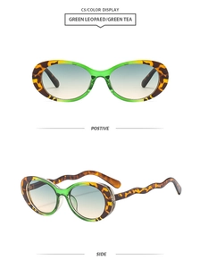 Detail of vintage oval sunglasses featuring wave-shaped temples and green leopard frames