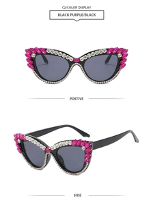 Detailansicht der Cat-Eye-Sonnenbrille mit Strasssteinen in Schwarz und Violett