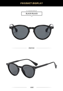 Detail view of round black sunglasses with silver rivet accents from front and side angles