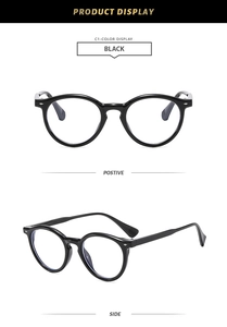 Detailed front and side view of black vintage round frames with metal stud accents