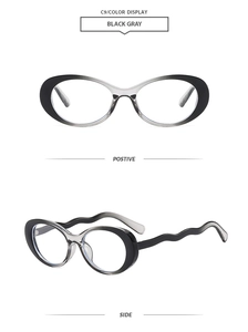 Detail view of oval cat-eye sunglasses with unique wavy temples and black gray gradient frames
