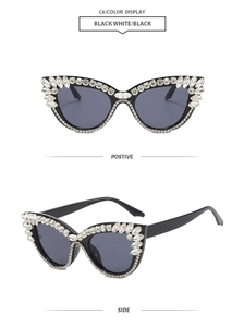 Detail der schwarzen Cat-Eye-Sonnenbrille mit Strassbesatz in der Vorder- und Seitenansicht