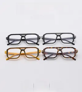 Flat lay of retro oversized polygon eyeglass frames in four trendy colors with rivet detail