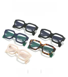 Detailed flat lay of irregular thick frame anti-blue light glasses in multiple colors