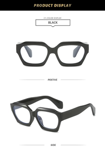 Detail view of black geometric polygon glasses frame with wide temples and glossy finish