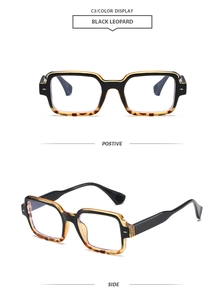 Detail view of square black leopard glasses frame with tortoise shell interior accents