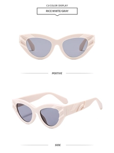 Detail view of rice white cat-eye sunglasses with gray lenses and textured wavy temples