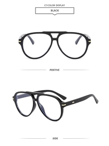 Detail view of black aviator sunglasses frame with gold accents from front and side angles