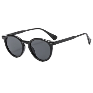 Retro round black sunglasses with silver star rivets and dark grey UV lenses