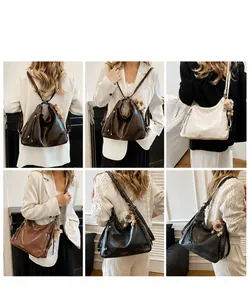 Detail showing various colors of large capacity leather hobo bags with tassel decor