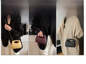 Bolso de noche minimalista de acrílico con cadena dorada y asa redonda integrada