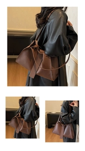 Detail of dark brown lychee texture leather shoulder bag with chic knotted strap design