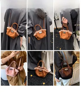 Suede bucket bags with faux shearling trim and silver metal twist locks in multiple colors