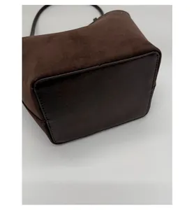 Detail view of the widened bottom base and reinforced stitching on a vintage tote bag