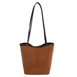 Brown suede bucket tote bag with dark leather straps for women's daily commute fashion