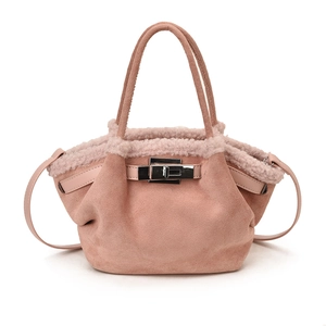 Pink suede bucket bag with faux fur lining and silver metal clasp for women