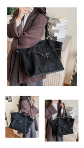 Détails du sac cabas vintage en daim noir avec sangles croisées et boucles dorées