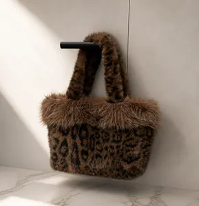 Close-up of leopard print faux fur handbag texture with soft plush trim detail