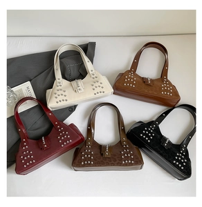 Multiple stylish baguette bags in leopard print and solid colors with silver stud accents