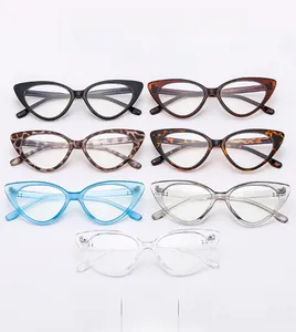 Detail showing variety of cat-eye eyewear frames in black, tortoiseshell and clear colors