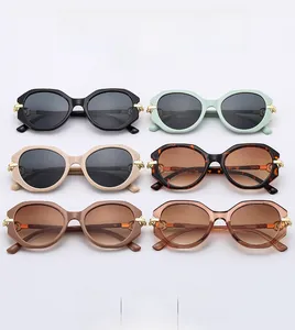 Detailed flat lay of oversized round sunglasses in six trendy assorted frame colors