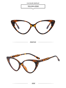 Detail view of tortoiseshell cat-eye glasses frame with metal rivets and sleek temples