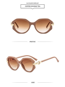 Detail of coffee-colored sunglasses showing geometric frames and gold chain-link temple joints