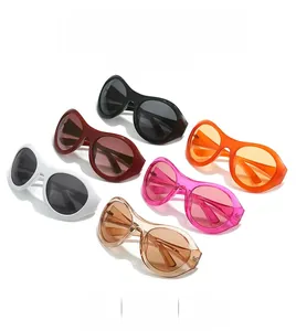 Detailed view of futuristic oversized round sunglasses in six vibrant matte colors