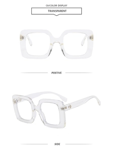 Detail view of transparent square frames with blue light blocking lenses and metal hinges
