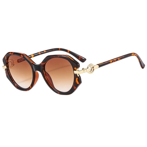 Retro oversized round sunglasses with tortoiseshell frames and brown gradient lenses