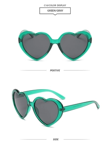 Front and side view of heart-shaped sunglasses in transparent green frame with dark grey lenses