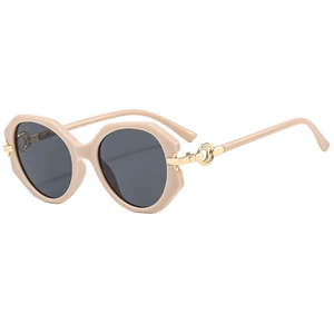 Beige oversized polygonal sunglasses with gray lenses and gold interlocking hinges