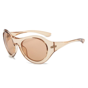 Fashion futuristic oversized round sunglasses in amber brown with a sleek resin frame