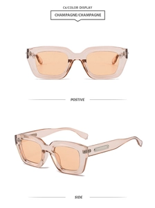 Détail de lunettes de soleil carrées champagne avec verres orange et accents métal