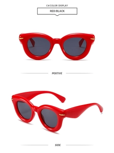 Detailed views of red puffy oval sunglasses with golden rivets and black lenses