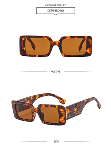 Detail view of tortoiseshell square sunglasses with textured checkered pattern temples