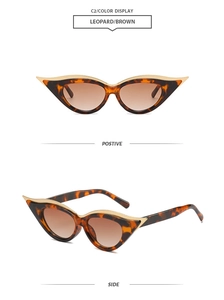 Detail of leopard print cat eye sunglasses with gold metal trim and brown gradient lenses