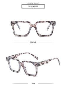 Detail view of square frame sunglasses with gray marble pattern on polished acetate