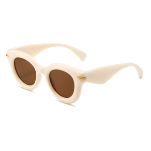 Retro cream oval sunglasses with thick puffy frames and golden metal accents