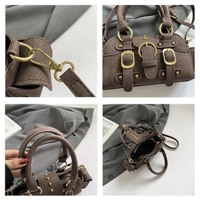 Detail view of brown textured leather handbag featuring vintage gold studs and hardware