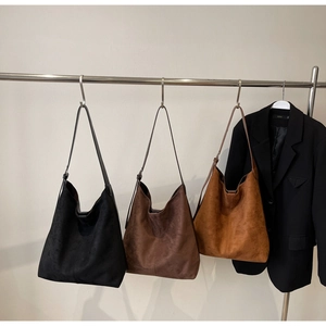 Three large capacity suede hobo shoulder bags in black, dark coffee, and caramel colors