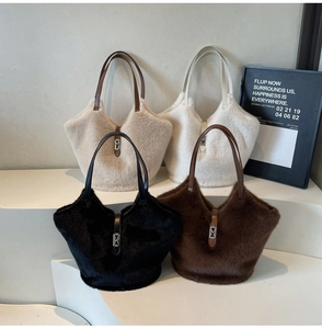 Detailed display of plush tote bags in cream, white, black, and brown with leather handles